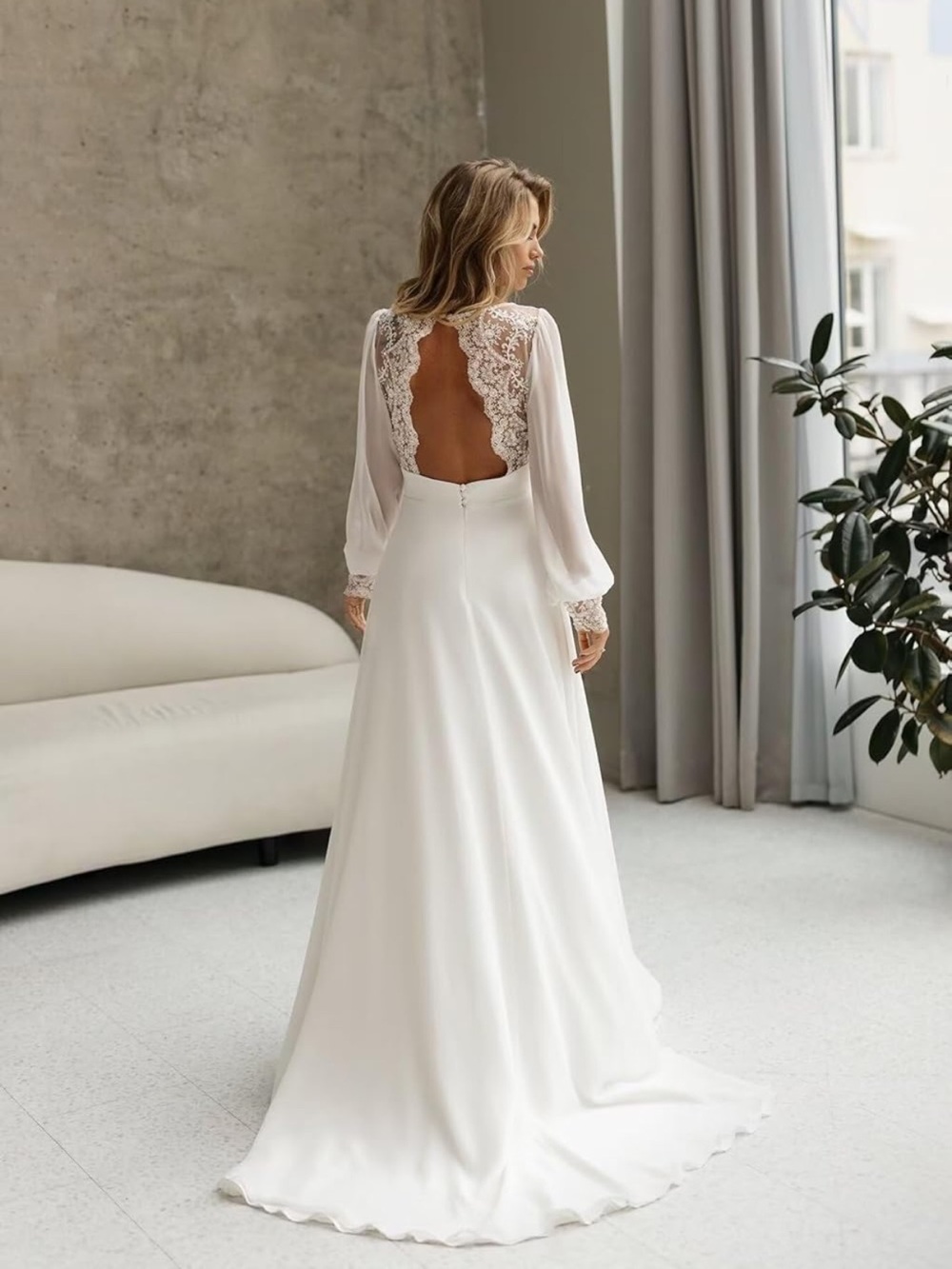 Elegant White Lace-Back Long Sleeve Wedding Dress
